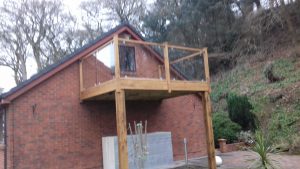 Oak and glass balcony 4